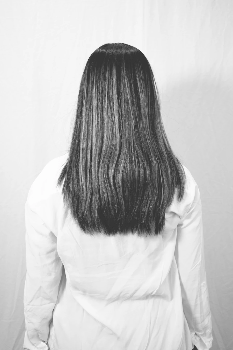 Guía de largos de cabello vista de espalda: corto hasta el hombro, mediano hasta el brasier, largo hasta la cintura y extra largo hasta la cadera
