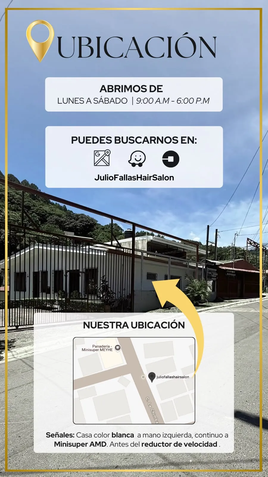 Fachada del estudio: casa blanca a mano izquierda, con indicaciones para llegar